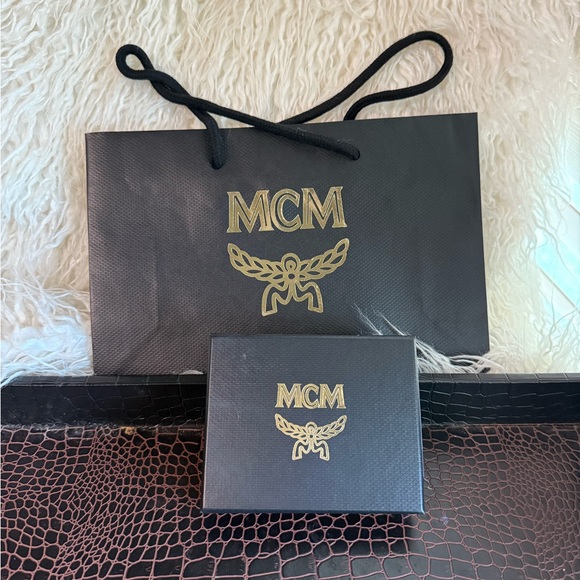 empty MCM Black and Gold box and bag. - Picture 1 of 3